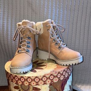 Never worn, with tags. US size 7 women’s. Lace up booties. From BUCKLE.